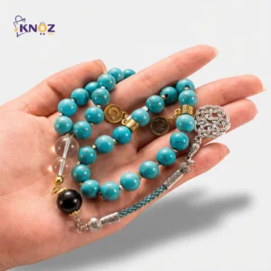 مسبحة حجر طبيعي مع شرابة فضية